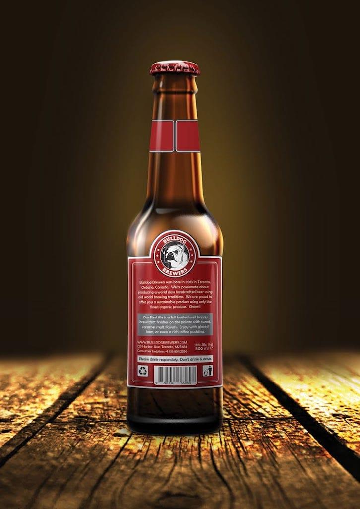 Red Ale beer bottle from behind on wooden table