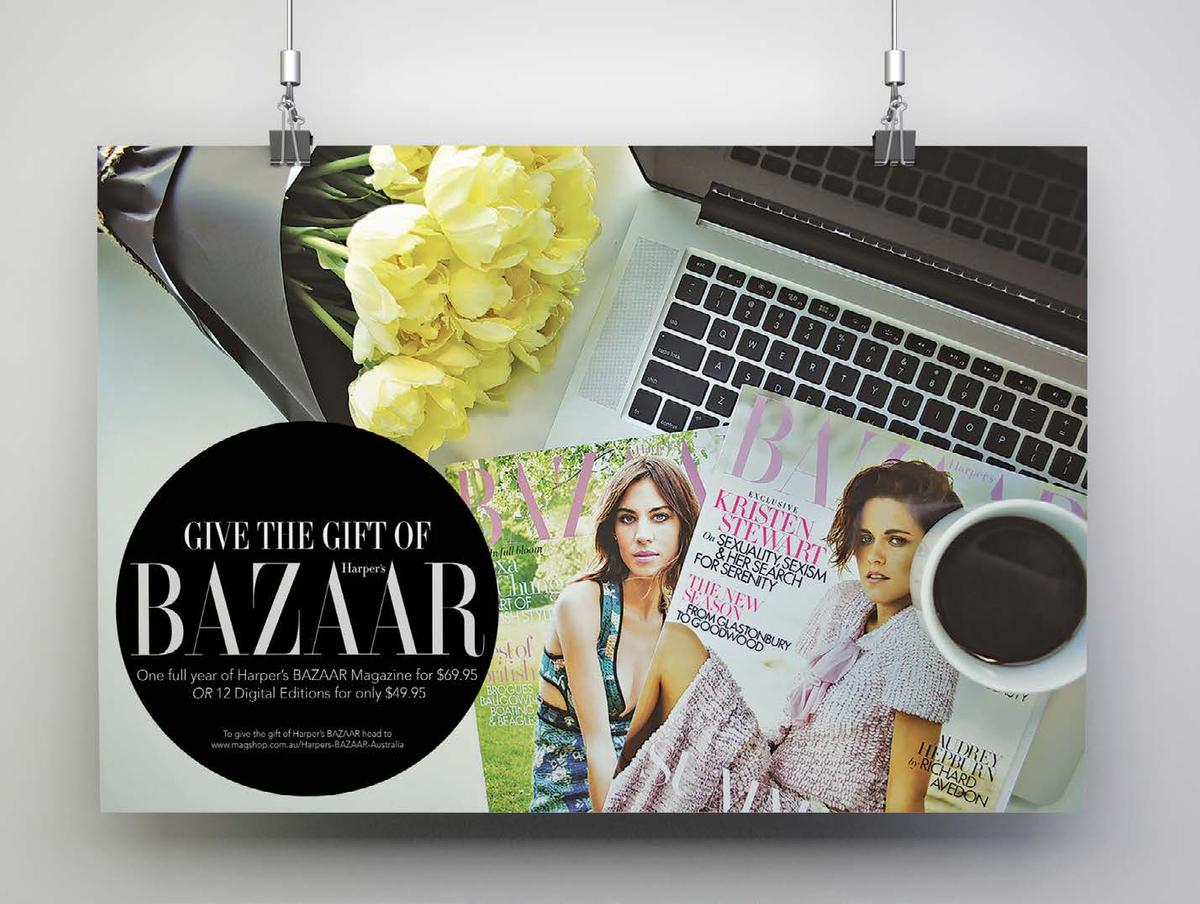 Hanging print of Bazaar magazine prints with yellow flowers, a cup of coffee and a macbook pro