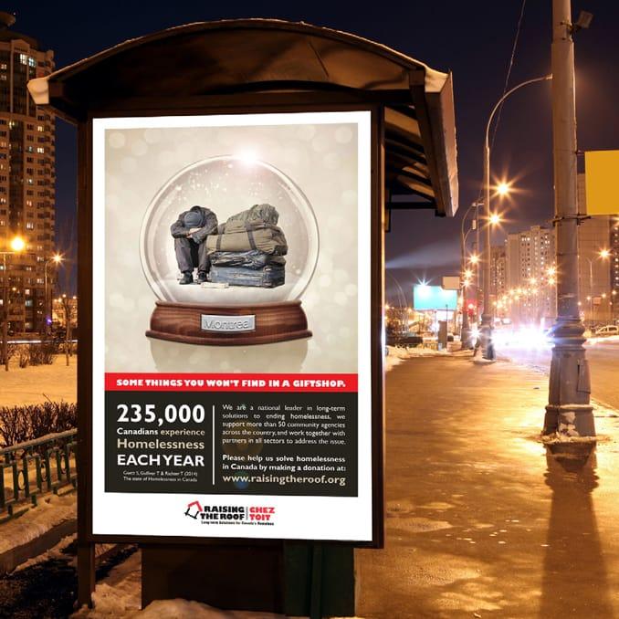 Poster for homeless awareness featuring a snowglobe on a bus stop at night